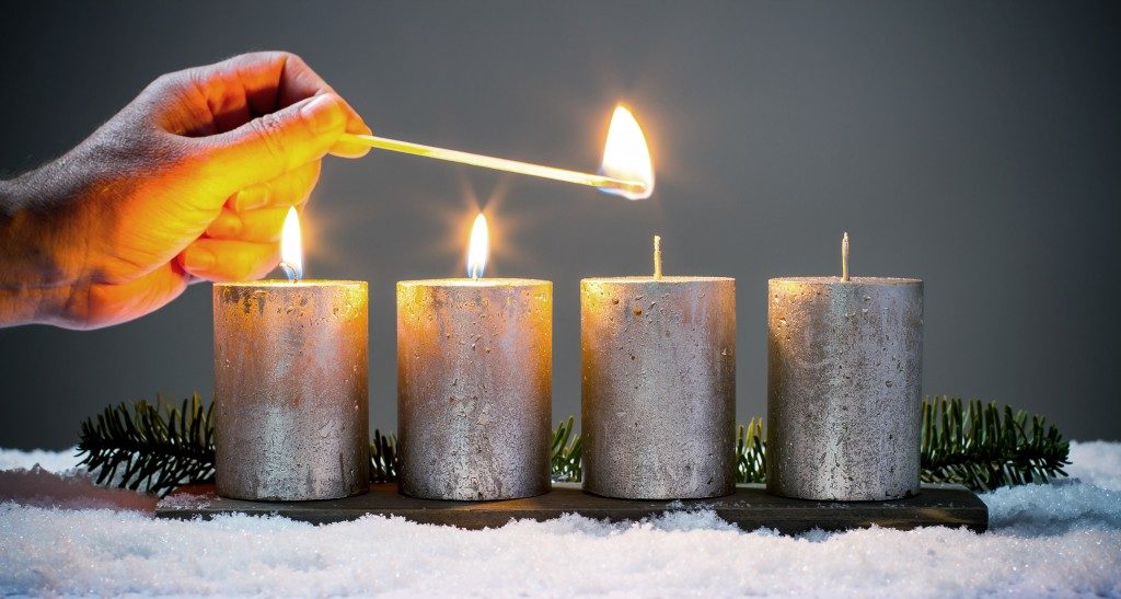 four advents candles with matches